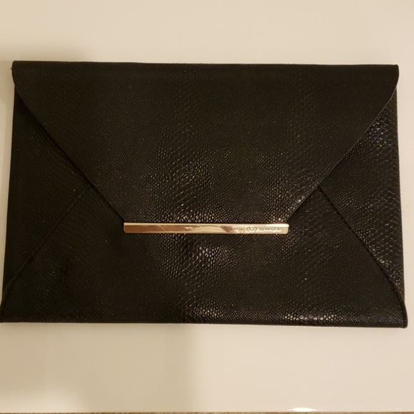 BCBG Handbags - Bcbg Harlow embossed envelope clutch
